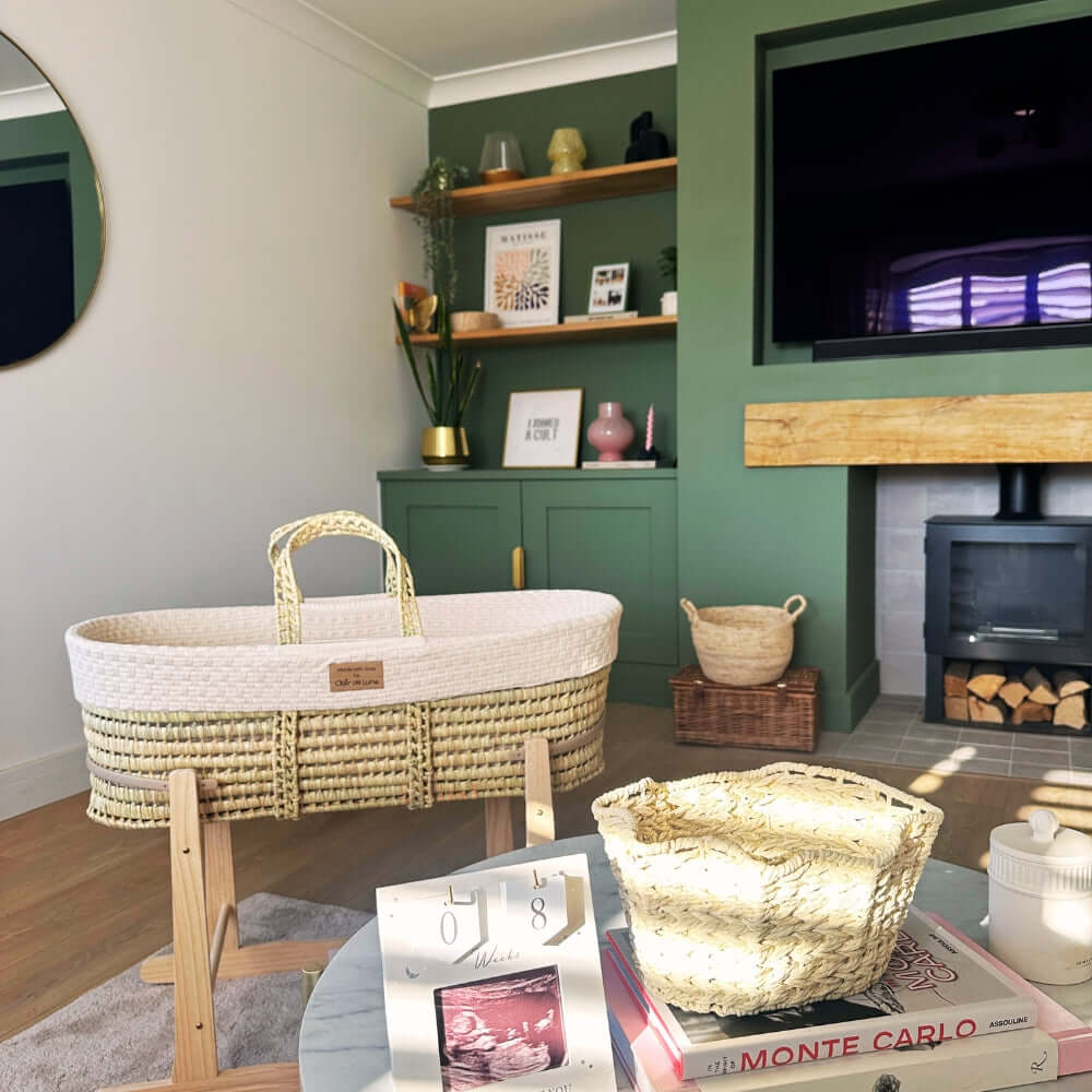 5 Tips for Creating a Cosy Nursery This Autumn | Cream Organic Knitted Moses Basket in a Forest Green Room - Clair de Lune UK