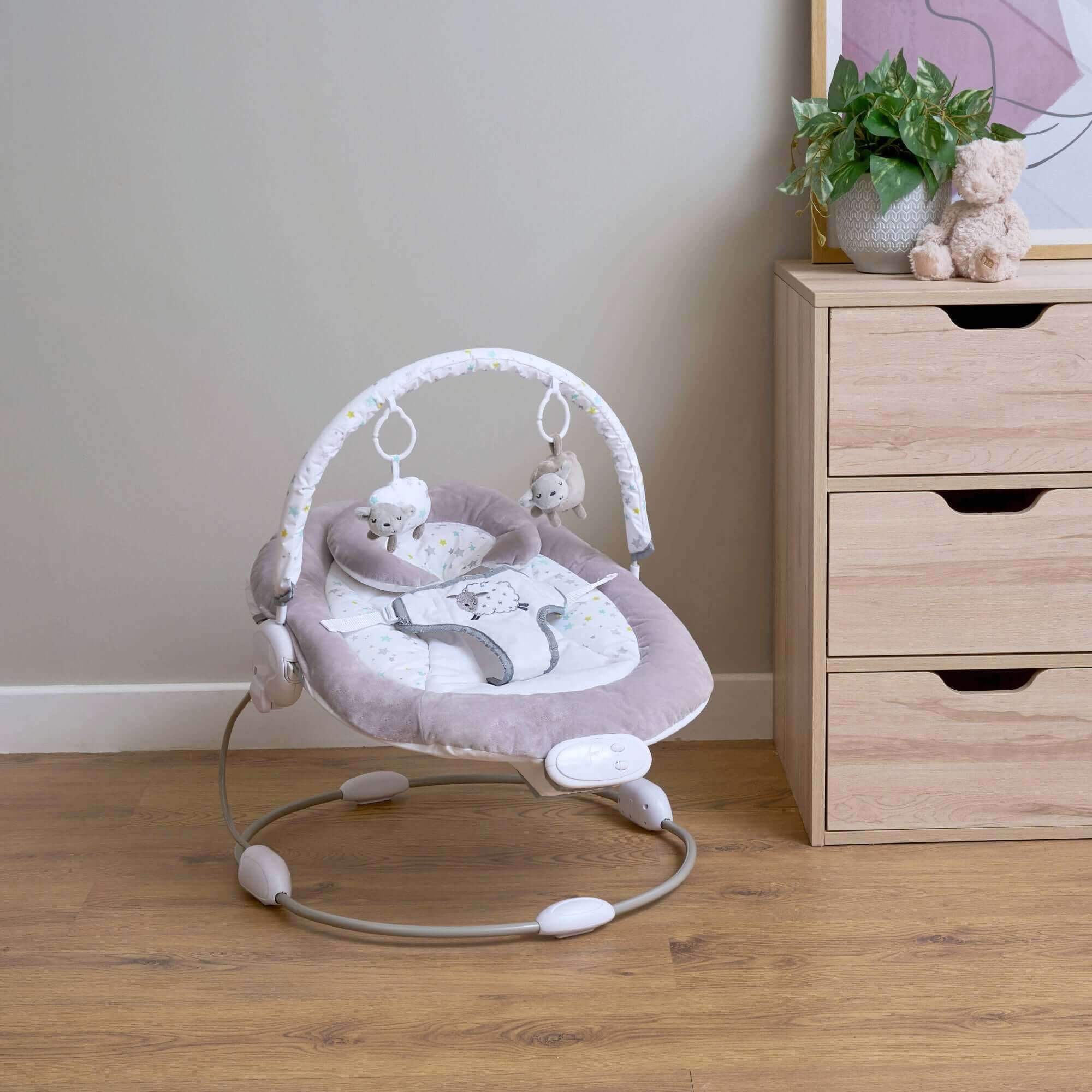 Buying Guide East Coast Counting Sheep Baby Bouncer Next to a Chest of Drawers in the Living Room | Newborn Seat | Rockers & Bouncers | Nursery Furniture - Clair de Lune UK