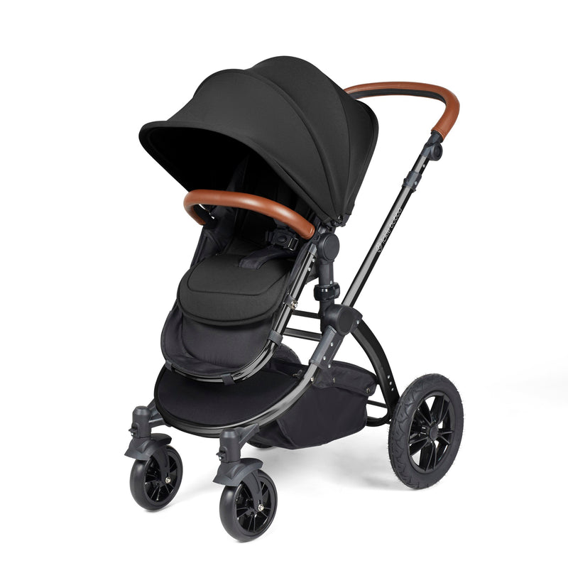 The pushchair of the Midnight Ickle Bubba Stomp Luxe All In One I Size Travel System With ISOFIX Base with the black chassis | Pushchairs and Travel Systems | Baby & Kid Travel - Clair de Lune UK