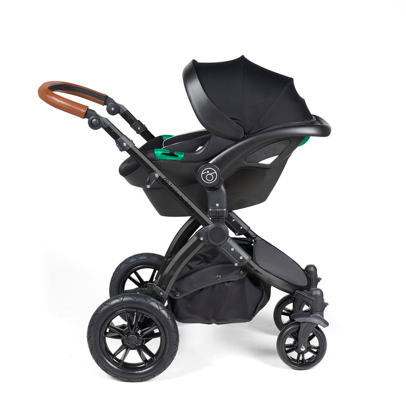 The car seat of the Midnight Ickle Bubba Stomp Luxe All In One I Size Travel System With ISOFIX Base with the black chassis | Pushchairs and Travel Systems | Baby & Kid Travel - Clair de Lune UK