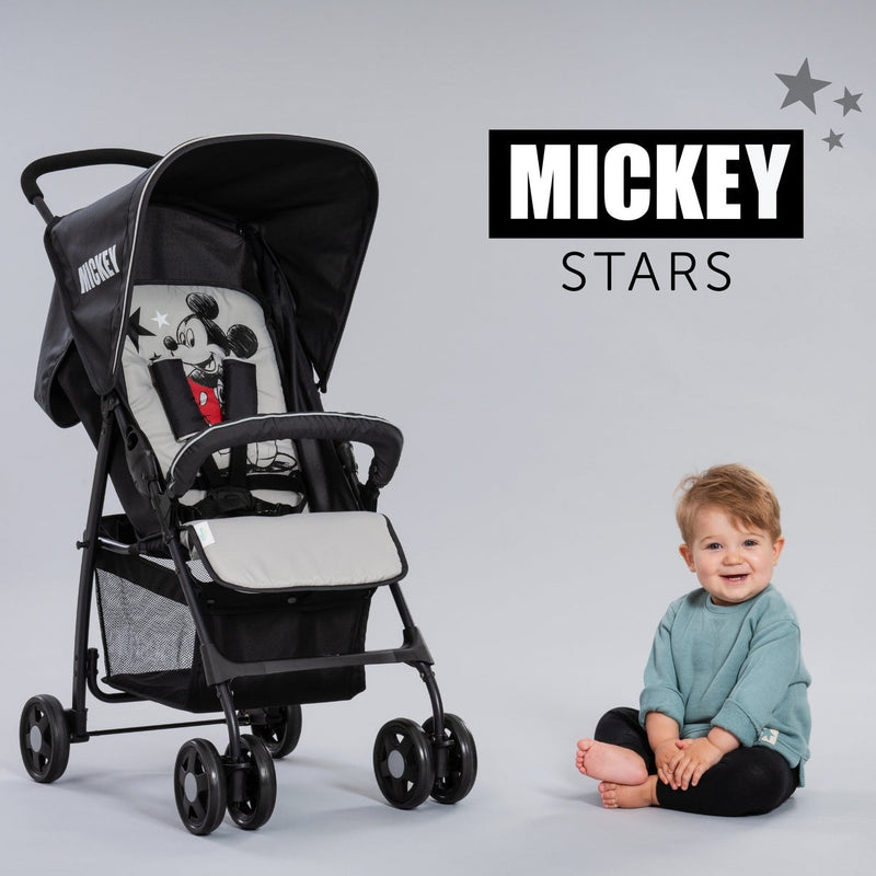 Toddler sitting next to his Mickey Stars Hauck Disney Sport Pushchair | Strollers, Pushchairs & Prams | Pushchairs, Carrycots & Car Seats Baby | Travel Essentials - Clair de Lune UK