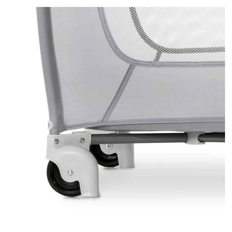The wheels of the Grey Star Hauck Play N Relax Centre 4in1 Travel Cot allowing parents to easily move the cot | Travel Cots & Travel Bassinets | Cots, Cot Beds, Toddler & Kid Beds | Nursery Furniture - Clair de Lune UK