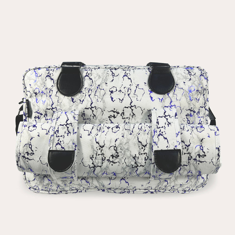 The front of the My Babiie Dani Dyer Metallic Blue Marble Deluxe Changing Bag | Stylish Nappy Bags | Travel With Baby - Clair de Lune UK