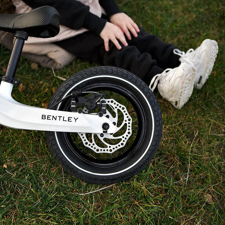 The stylish black and white of the Glacier White Bentley Balance Bike | Toddler Bikes | Montessori Activities For Babies & Kids - Clair de Lune UK