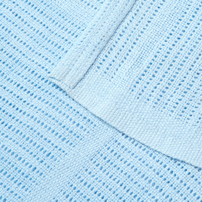 Showcasing the cell construction of the Soft Cotton Cellular Pram Blanket in blue to keep babies warm in the winter and cool in summer | Cosy Baby Blankets | Nursery Bedding | Newborn, Baby and Toddler Essentials - Clair de Lune UK