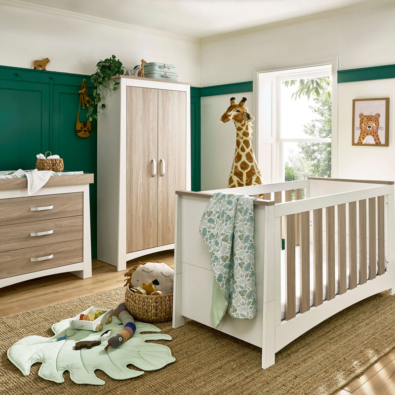 White and Natural 3-piece room set including a natural and white cot bed, a matching wardrobe and a matching changer from the CuddleCo Ada Cot Bed & Nursery Room Sets in a trendy green nursery room | Nursery Furniture Sets | Room Sets | Nursery Furniture 