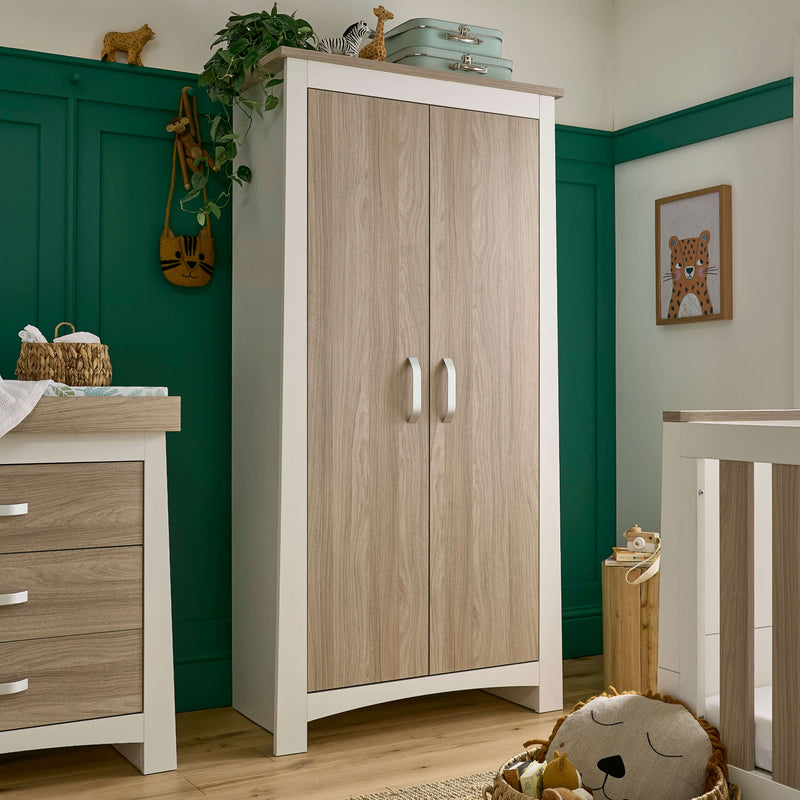 White and Natural Double Wardrobe from the CuddleCo Ada Cot Bed & Nursery Room Sets in a trendy green nursery room | Nursery Furniture Sets | Room Sets | Nursery Furniture - Clair de Lune UK