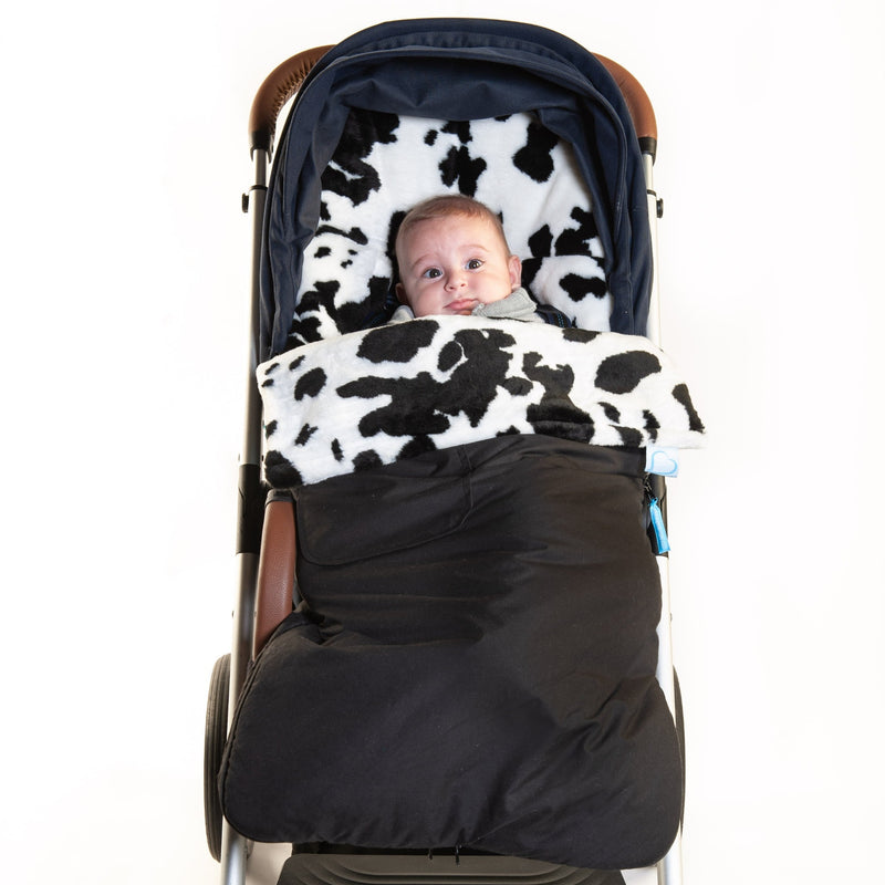 Black and White Cow Moo Buggysnuggle Explorer Snuggle Fur Footmuff | Pushchair Cosytoes & Footmuffs | Travel Accessories - Clair de Lune UK