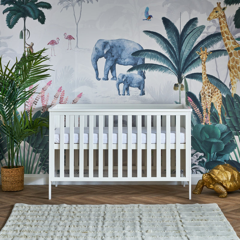 White Evie Cot Bed as a crib of the Obaby Evie Room Sets in a jungle safari inspired nursery room | Nursery Furniture Sets | Room Sets | Nursery Furniture - Clair de Lune UK