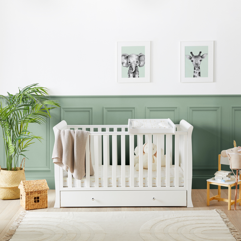 The cot bed with cot top changer of the of the Ickle Bubba Snowdon Classic Nursery Room Sets in a Sage Green nursery room | Nursery Furniture Sets | Room Sets | Nursery Furniture - Clair de Lune UK