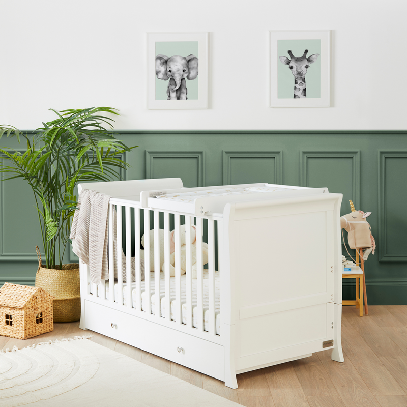 The cot bed of the of the Ickle Bubba Snowdon Classic Nursery Room Sets in a Sage Green nursery room | Nursery Furniture Sets | Room Sets | Nursery Furniture - Clair de Lune UK