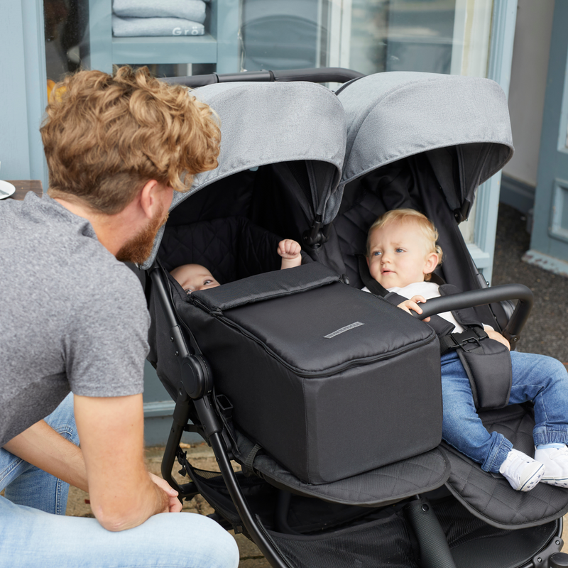 Dad looking after his twins sleeping in the Grey Ickle Bubba Venus Prime Double Stroller | Buggies, Strollers & Pushchairs | Travel With Your Baby - Clair de Lune UK