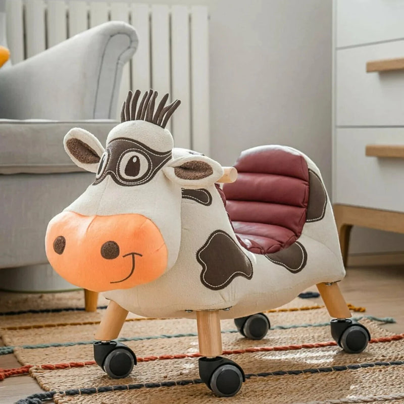 Little Bird Told Me Moobert Cow Ride On Toy in a natural Scandi nursery | Baby Walkers and Ride On Toys | Montessori Activities For Babies & Kids | Toys | Baby Shower, Birthday & Christmas Gifts - Clair de Lune UK