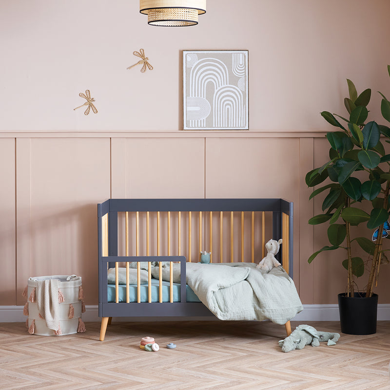 The Obaby Maya Mini cot bed from the Scandi Slate Obaby Maya Mini 2 Piece Room Set transformed to a toddler bed with a toddler rail | Nursery Furniture Sets | Room Sets | Nursery Furniture - Clair de Lune UK