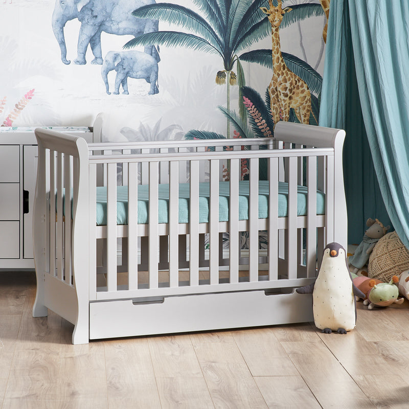 The warm grey Obaby Stamford Mini Sleigh Cot Bed in a jungle safari inspired nursery room | Cots, Cot Beds, Toddler & Kid Beds | Nursery Furniture - Clair de Lune UK