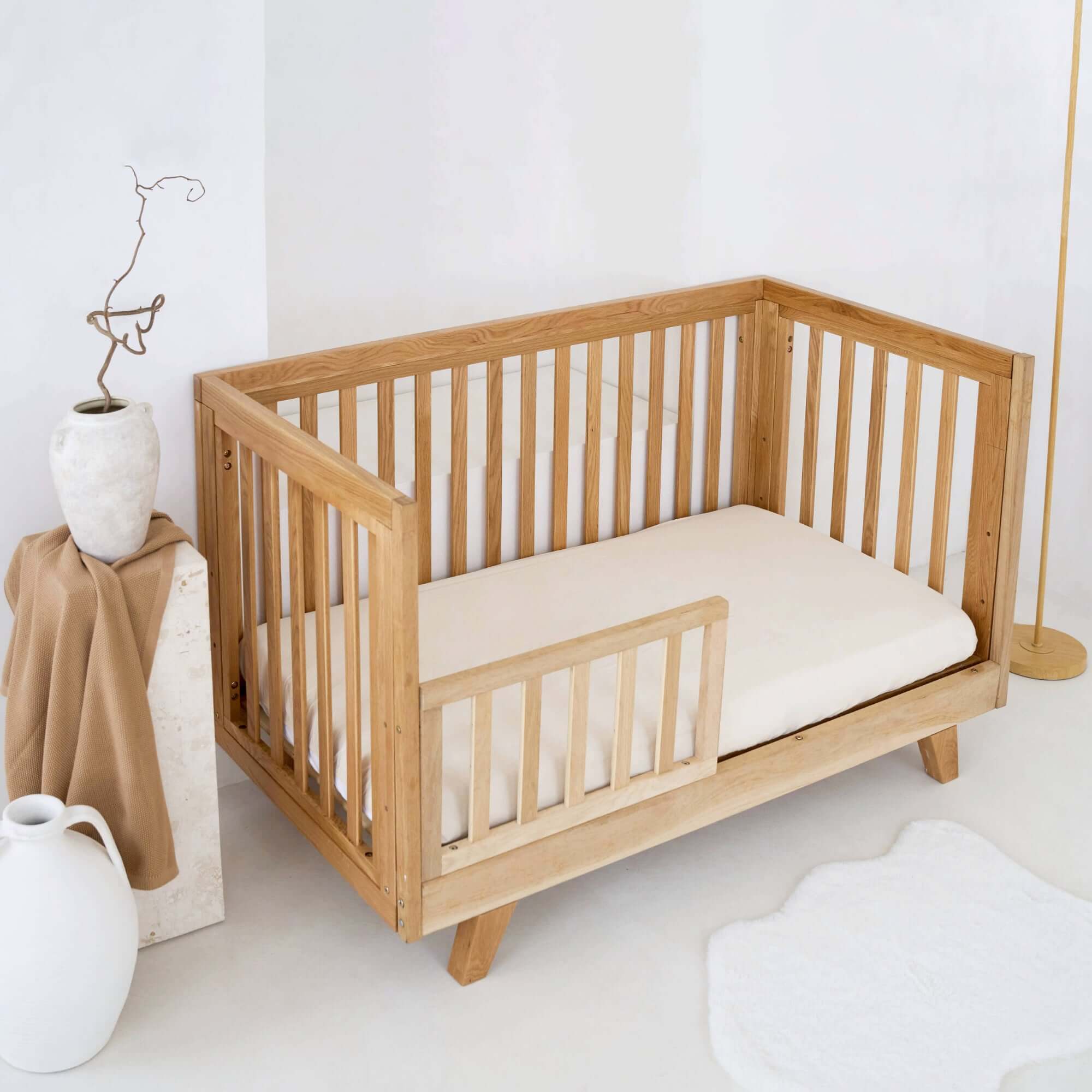 Oak Cot Bed in a stylish minimalist white Nursery Room | Cots, Cot Beds, Toddler & Kid Beds | Baby Bed | Nursery Furniture - Clair de Lune UK