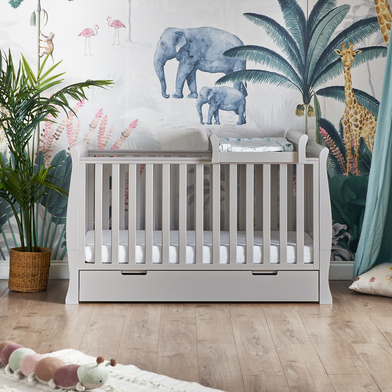 Warm Grey Obaby Stamford Sleigh Cot Top Changer on the warm grey Stamford Cot | Baby Changing Units, Tables & Cot Top Changers | Baby Bath Time - Clair de Lune UK