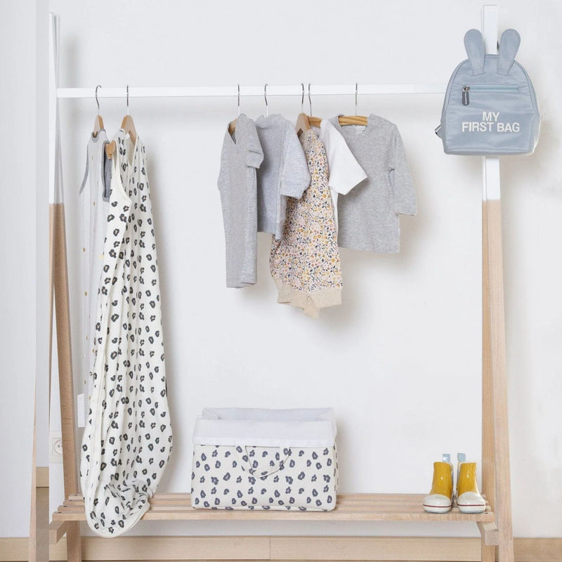 Baby boy clothes hanging on the Childhome Tipi Open Clothes Rack | Clothes Racks, Wardrobes & Shelves | Storage Solutions | Nursery Furniture - Clair de Lune UK