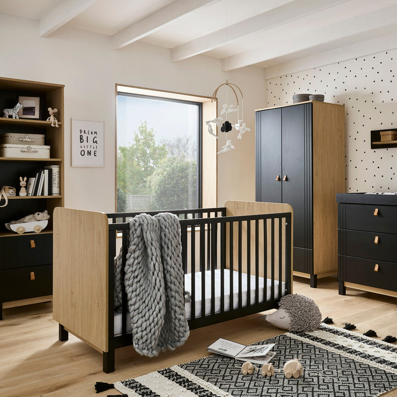 The 5-Piece Room Set including a black and natural cot bed, a matching double wardrobe, a matching bookcase, a matching dresser and a matching shelf from the Black and Natural CuddleCo Rafi Nursery Room Sets in a monochrome style nursery furniture room | 