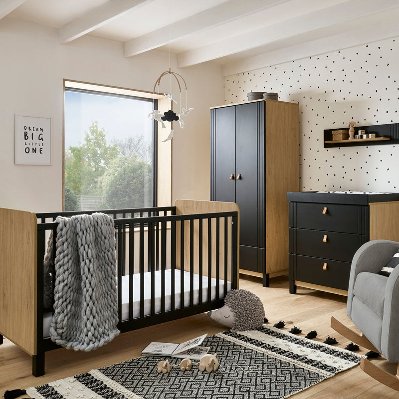  The 3-Piece Room Set including a black and natural cot bed, a matching double wardrobe and a matching dresser from the Black and Natural CuddleCo Rafi Nursery Room Sets in a monochrome style nursery furniture room | Nursery Furniture Sets | Room Sets | N