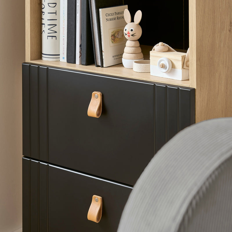 The spacious drawers of the double wardrobe from the Black and Natural CuddleCo Rafi Nursery Room Sets with baby clothes in a monochrome style nursery furniture room | Nursery Furniture Sets | Room Sets | Nursery Furniture - Clair de Lune UK