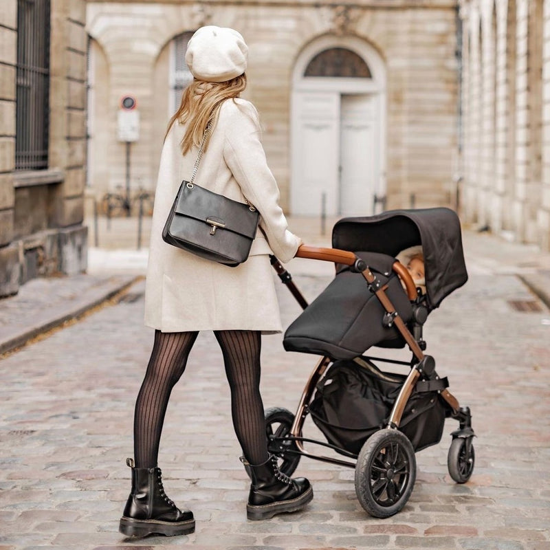 Mum pushing her Midnight Black Ickle Bubba Stomp V4 2 in 1 Pushchair & Carrycot | Pushchairs and Travel Systems | Baby & Kid Travel - Clair de Lune UK