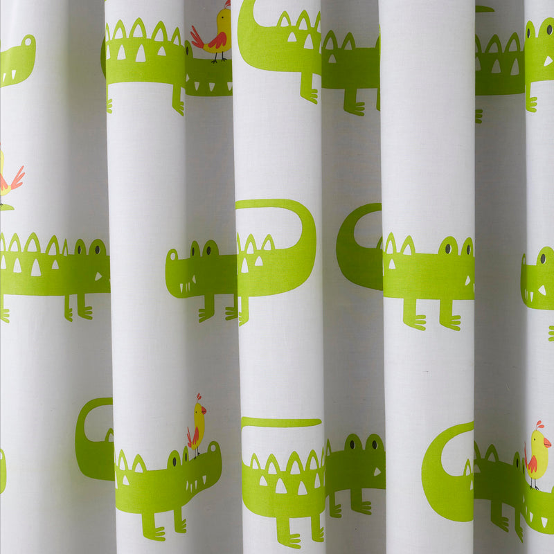 The green crocodile details of the Cosatto Crocodile Smiles Pencil Pleat Curtains - 66" Width x 72" Drop | Curtains | Nursery Decorations | Nursery Furniture - Clair de Lune UK