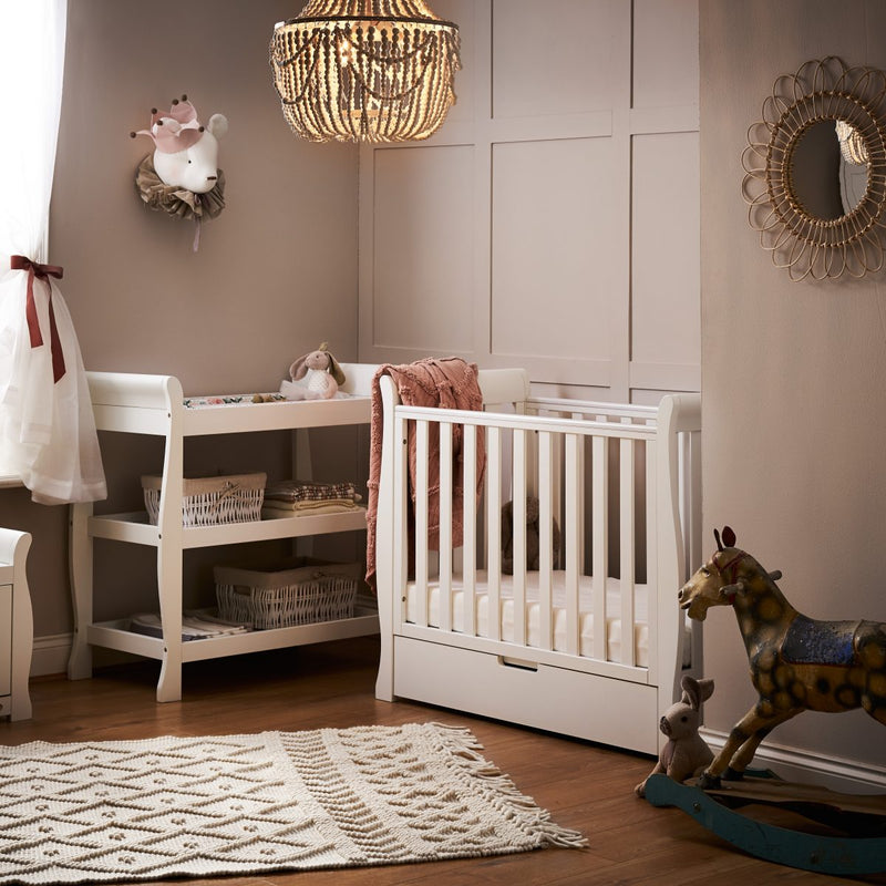 The white Obaby Stamford Space Saver Cot & Changing Unit in a cream gender-neutral nursery room | Nursery Furniture Sets | Room Sets | Nursery Furniture - Clair de Lune UK