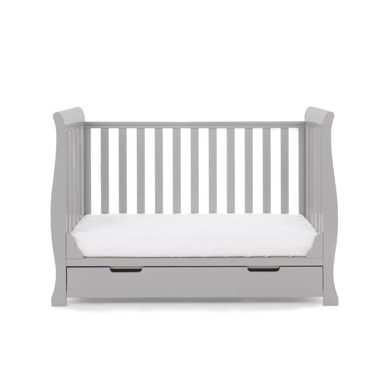 The warm grey Obaby Stamford Mini Sleigh Cot Bed without a side wall | Cots, Cot Beds, Toddler & Kid Beds | Nursery Furniture - Clair de Lune UK