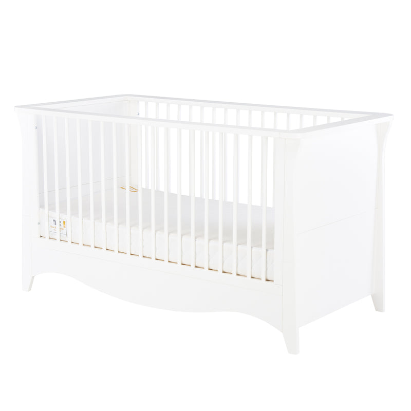  The cot bed of the White CuddleCo Clara 3pc Nursery Set - 3 Drawer Dresser/Changer, Cot Bed & Wardrobe | Nursery Furniture Sets | Room Sets | Nursery Furniture - Clair de Lune UK