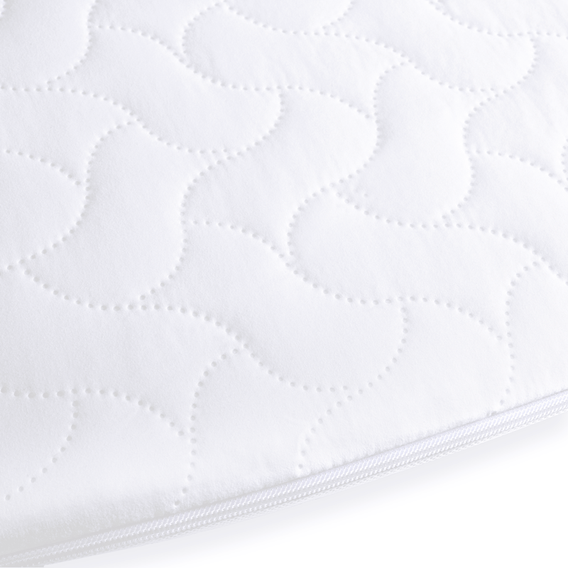 The breathable cover of the Quilted Microfibre Bedside Crib Mattress (76 x 40 cm) | Bedside & Folding Crib Mattresses | Baby Mattresses | Bedding | Nursery Furniture - Clair de Lune UK