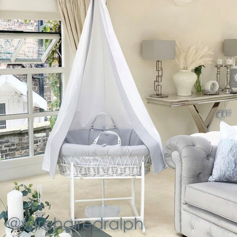 Waffle White Wicker Moses Basket Starter Set & Deluxe Drape in a living room taken by a customer | Drape Sets | Moses Baskets and Stands | Co-sleepers | Nursery Furniture - Clair de Lune UK