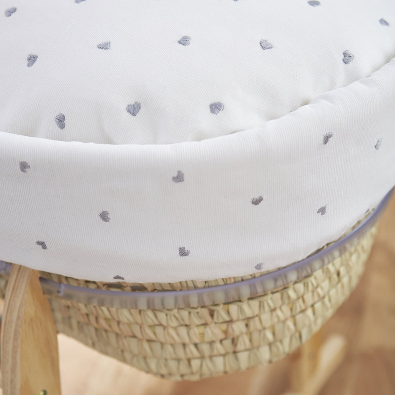 Lullaby Hearts Palm Moses Basket showcasing the delicately embroidered grey hearts on an ivory-white cotton fabrics | Moses Baskets | Co-sleepers | Nursery Furniture - Clair de Lune UK