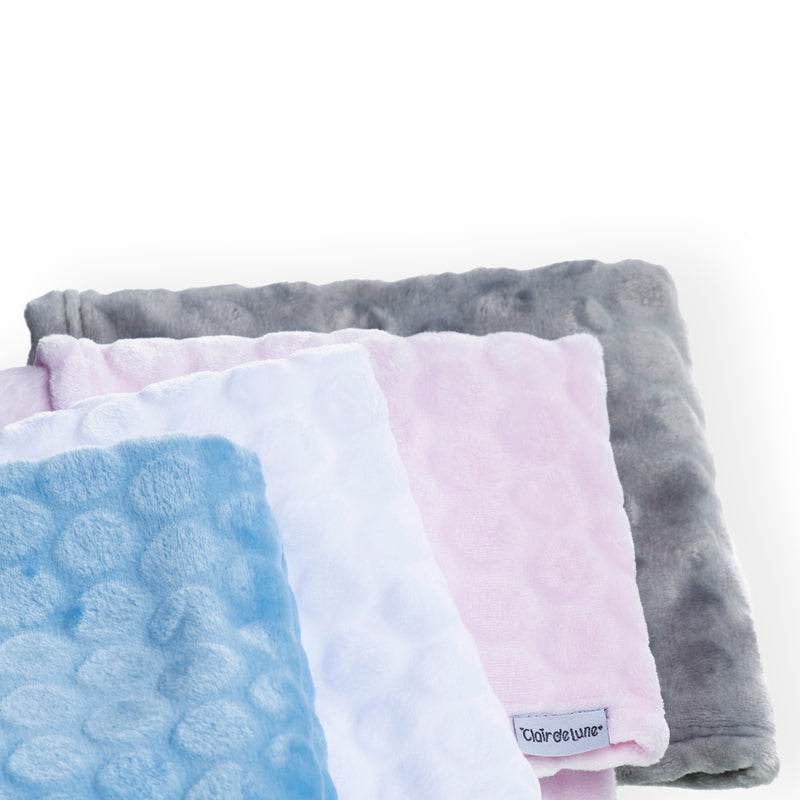 A stack of folded Marshmallow Baby Blankets in four colours | Cosy Baby Blankets | Nursery Bedding | Newborn, Baby and Toddler Essentials - Clair de Lune UK
