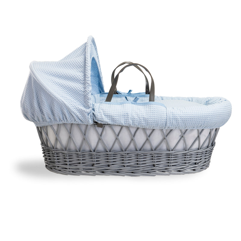 Blue Waffle Grey Wicker Moses Basket coming complete with an adjustable, removable hood, padded liner that covers the interior walls of the basket, two carry handles, a coverlet, and a firm, hypoallergenic fibre mattress | Moses Baskets | Co-sleepers | Nu
