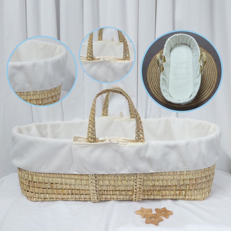 Cream Replacement Fleece Moses Basket Liner on a palm Moses basket | Moses Basket Dressings | Nursery Bedding & Decor Collections | Nursery Inspiration - Clair de Lune UK