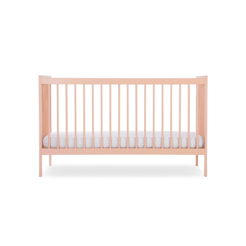 The pastel pink cot bed of the Blush Pink CuddleCo Nola 3 Piece Room Set | Nursery Furniture Sets | Room Sets | Nursery Furniture - Clair de Lune UK