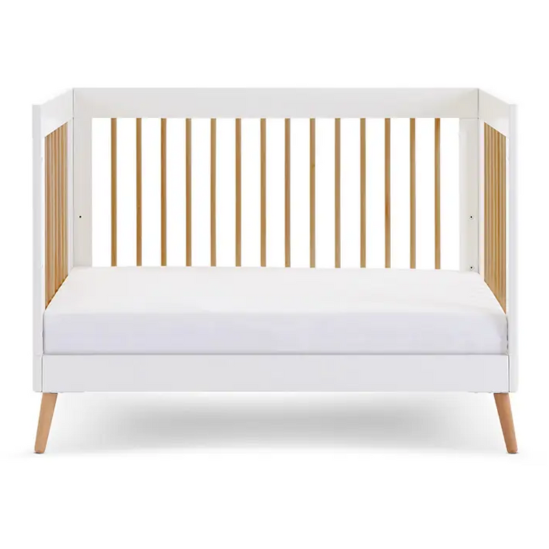 The white cot bed of the Obaby Maya Mini 2 Piece Room Set in white transformed to a white and natural toddler bed | Nursery Furniture Sets | Room Sets | Nursery Furniture - Clair de Lune UK