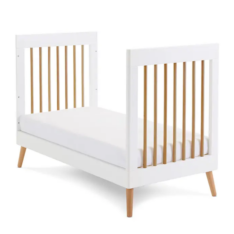 The white cot bed of the Obaby Maya Mini 2 Piece Room Set in white transformed to a white and natural toddler bed without side walls | Nursery Furniture Sets | Room Sets | Nursery Furniture - Clair de Lune UK