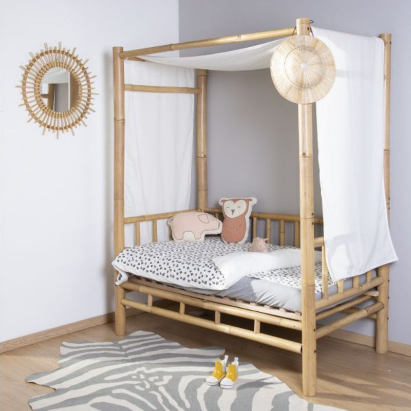 The Childhome Leopard Cot/Cot Bed Duvet Cover with Pillowcase in a rattan natural nursery | Toddler Bedding - Clair de Lune UK