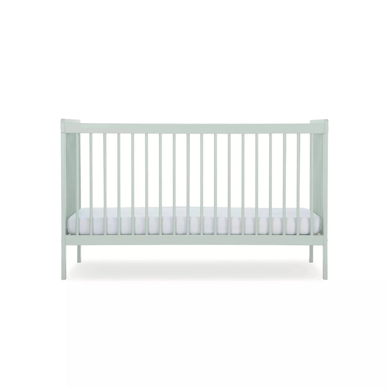 The pastel green cot bed of the Sage Green CuddleCo Nola 3 Piece Room Set | Nursery Furniture Sets | Room Sets | Nursery Furniture - Clair de Lune UK