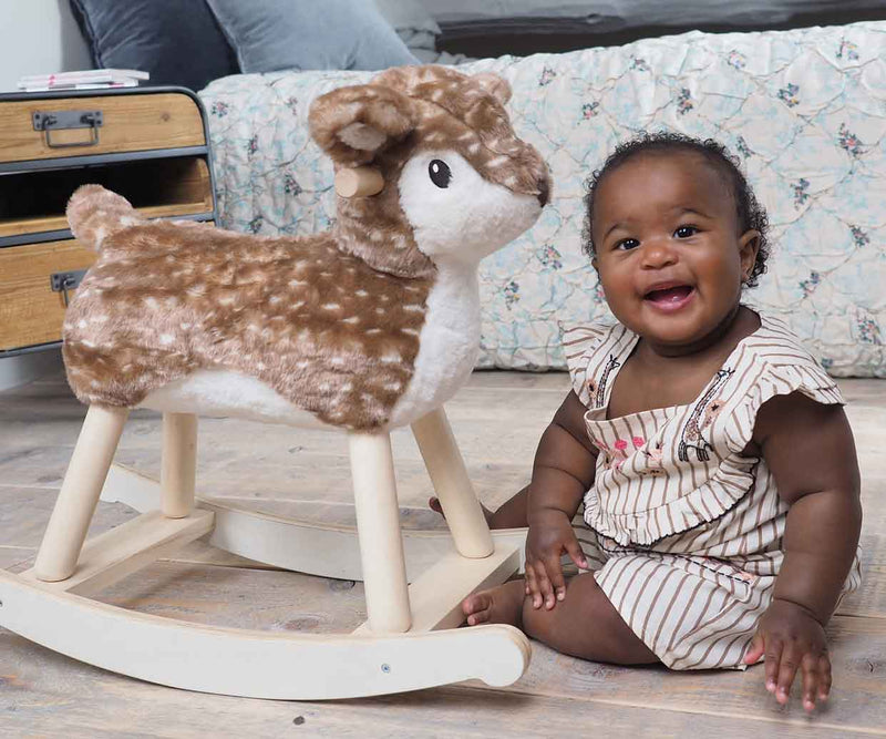 Toddler girl next to the Little Bird Told Me Willow Rocking Deer | Rocking Animals | Montessori Activities For Babies & Kids | Toys | Baby Shower, Birthday & Christmas - Clair de Lune UK