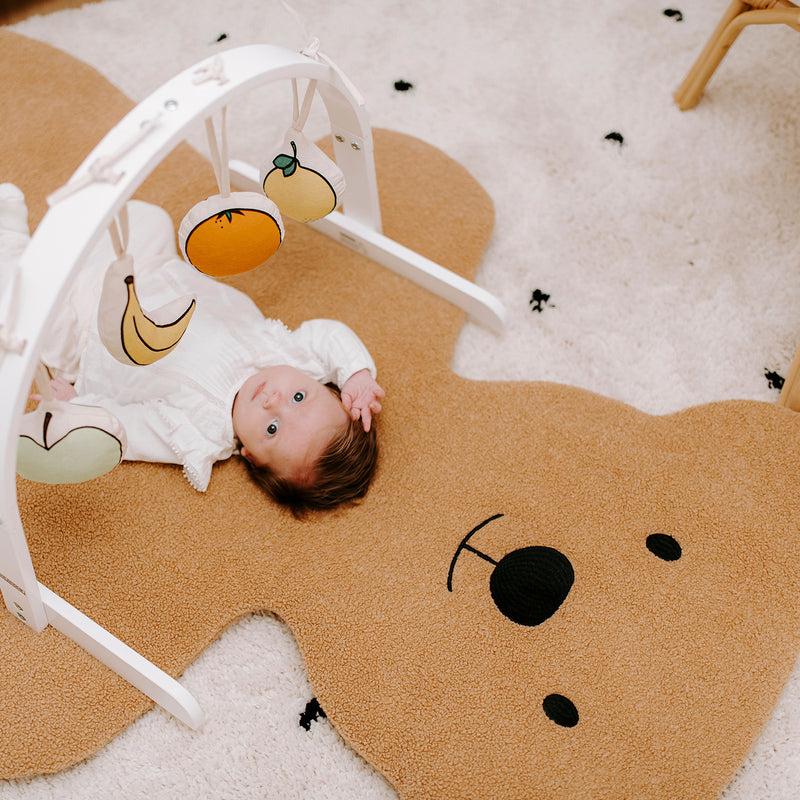 Baby playing with toys on the Childhome Teddy Playmat | Toys | Baby Shower, Birthday & Christmas Gifts - Clair de Lune UK