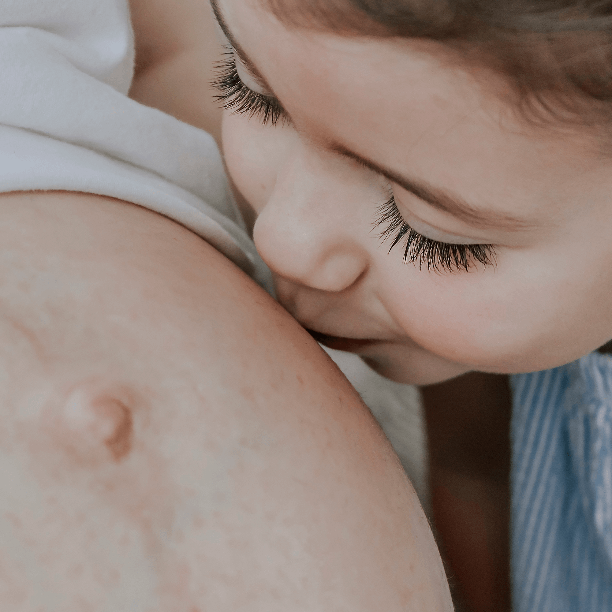 Toddler kissing pregnancy baby bump | Parenting tips and advice - Clair de Lune UK