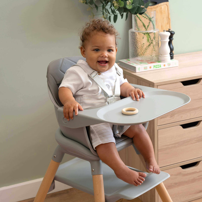 Happy baby sat in the Clair de Lune 6 in 1 High Chair in the kitchen | High Chairs | Feeding & Weaning - Clair de Lune UK