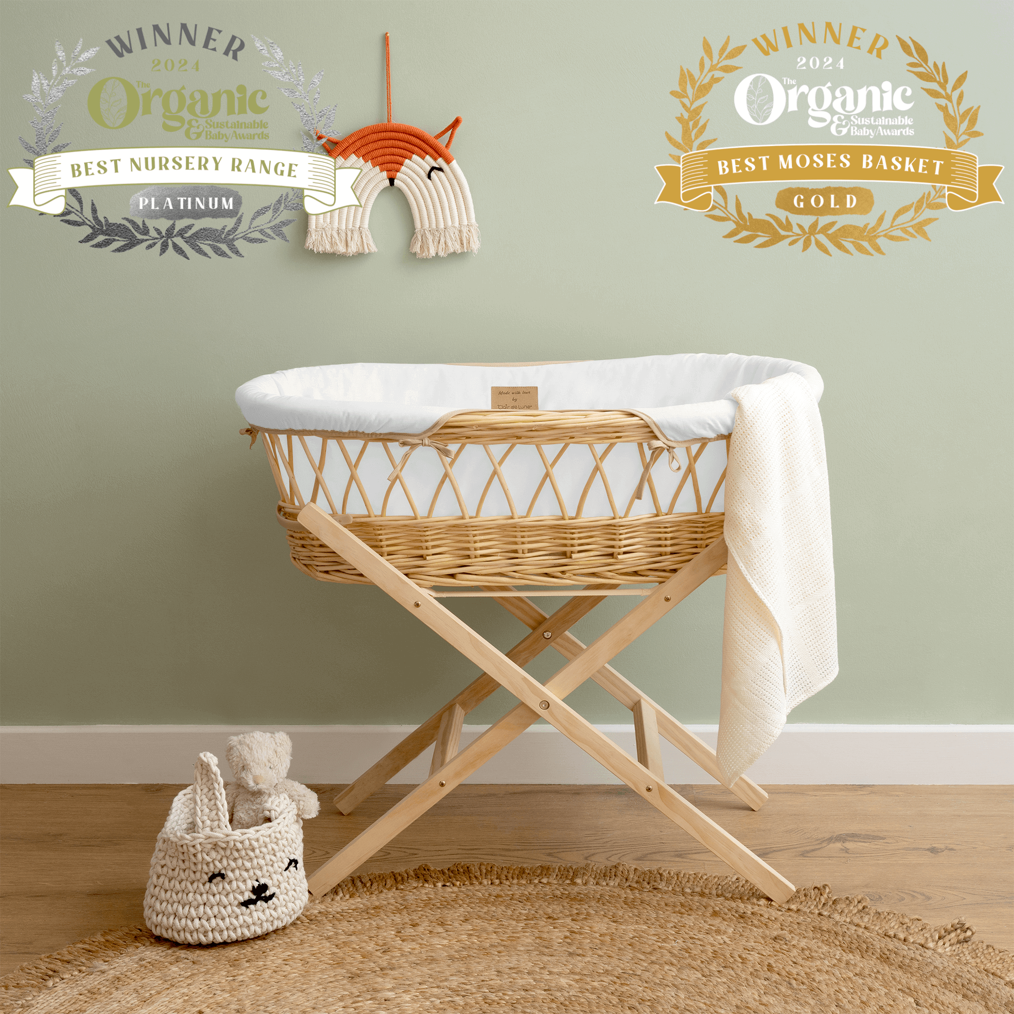 The Organic Natural Wicker Moses Basket in White in a Sage Nursery Showcasing the Organic & Sustainability Awards | Celebrating Clair de Lune’s Triumph at the Organic & Sustainable Baby Awards| News - Clair de Lune UK