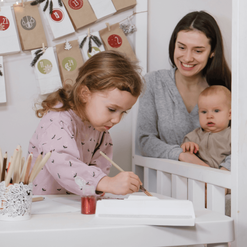 Mum and her children making Christmas crafts | Family Christmas - Clair de Lune UK