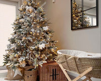 The Ultimate Baby Christmas Gift Guide 2025 | Organic Palm Moses Basket by the Christmas Tree - Clair de Lune UK