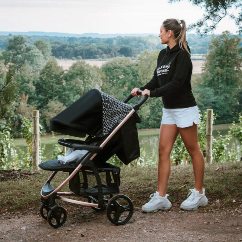 Sam Faiers from the mummy diaries pushing her son in the pram/stroller outside | Body positivity - Clair de Lune UK