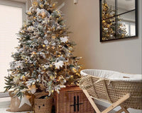 The Ultimate Baby Christmas Gift Guide 2025 | Organic Palm Moses Basket by the Christmas Tree - Clair de Lune UK